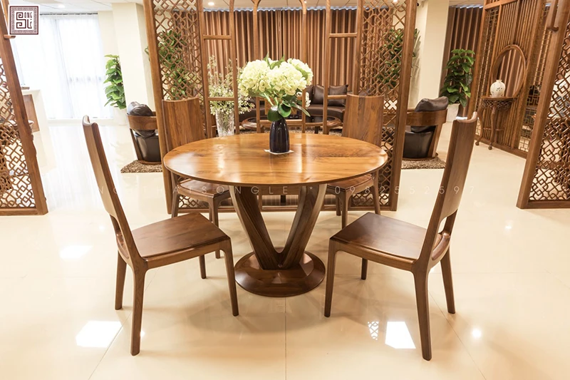 Bàn ăn gỗ óc chó dáng tròn